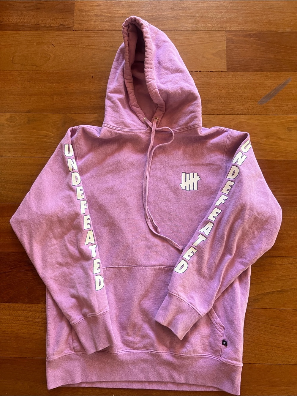 Undefeated Lavender Pullover Hoodie with White Sleeve Logos